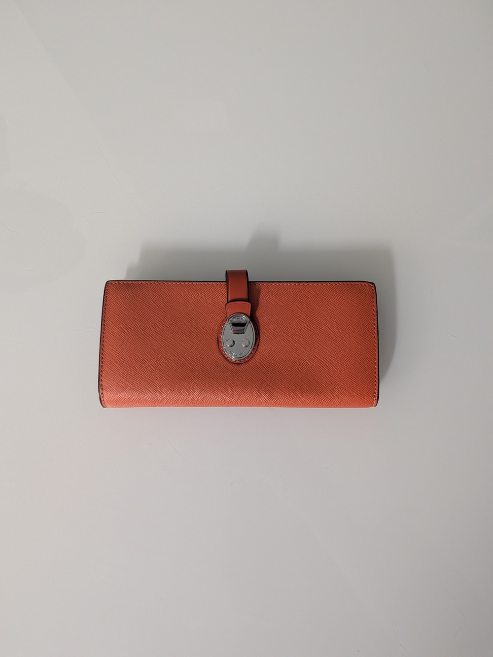 Tumi Leather Continental Wallet - Turn-Lock Closure